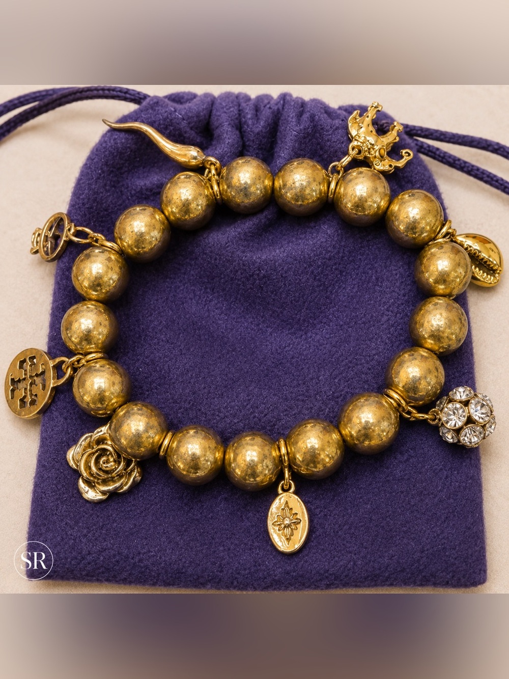 Tory Burch Gold Tone Beaded Charm Stretch Bracelet Logo Rhinestone Shell Rose